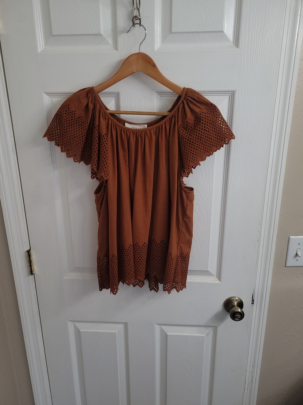 THE GREAT. Rust Off-Shoulder Eyelet Flutter Sleeve Top